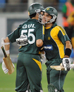 Misbah-ul-Haq celebrates the win with Umar Gul, Pakistan v Australia, 1st ODI, Dubai, April 22, 2009
