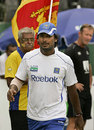 The victorious captain Kumar Sangakkara walks to pick up the series trophy, Sri Lanka v New Zealand, 2nd Test, SSC, 5th day, August 30, 2009