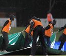 The groundstaff get busy with the covers, Australia v India, ICC Champions Trophy, Group A, Centurion, September 28, 2009