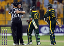 Tim Southee and Shane Bond celebrate, Saeed Ajmal and Mohammad Aamer trudge off, Pakistan v New Zealand, 3rd ODI, Abu Dhabi, November 9, 2009