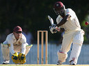 Travis Dowlin prepares to smash it, Queensland v West Indians, Allan Border Field, Brisbane, 3rd day, November 20, 2009