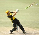 Mitchell Marsh lets his bat go trying for a midwicket slog, Western Australia v New South Wales, FR Cup, Perth, November 25, 2009