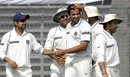 Zaheer Khan is congratulated by his team-mates as he runs through the Bangladesh line-up, Bangladesh v India, 2nd Test, Mirpur, 4th day, January 27, 2010