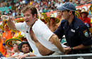 A spectator is taken away by a security staff, Australia v West Indies, 3rd ODI, Sydney, February 12, 2009 