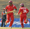 Singapore openers Buddika Mendis and Chetan Suryawanshi take a run during their 95-run stand, Bahrain v Singapore, ICC World Cricket League Division Five, Nepal, February 20, 2010