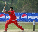 Monish Arora drives during his unbeaten 94, Fiji v Singapore, ICC World Cricket League Division Five, Lalitpur, February 23, 2010