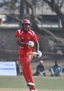 Buddika Mendis celebrates after hitting the winning runs, Singapore v Jersey, World Cricket League Division 5, Nepal, February 26, 2010