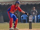 Thomas le Lievre breaks the stumps, Fiji v Jersey, ICC World Cricket League Division 5, February 27, 2010
