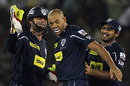 Adam Gilchrist congratulates Andrew Symonds the bowler, Deccan Chargers v Delhi Daredevils, IPL, Cuttack, March 21, 2010