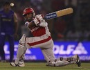 Manvinder Bisla sweeps during his 35 off 18 balls, Kings XI Punjab v Rajasthan Royals, IPL, Mohali, March 24, 2010