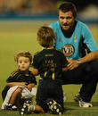 Dirk Nannes spends time with his children after the game, West Indies v Australia, World Twenty20, Super Eights, Group F, St Lucia, May 11, 2010