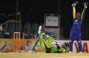 Kumar Sangakkara lets out a loud appeal, while Shahid Afridi struggles with cramps, Sri Lanka v Pakistan, Asia Cup, Dambulla, June 15, 2010