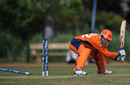 Atse Buurman is castled by Hamid Hassan, Netherlands v Afghanistan, ICC WCL Division 1, Voorburg, July 7, 2010