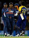 Virender Sehwag congratulates Kumar Sangakkara as Suresh Raina looks on, Sri Lanka v India, tri-series, 5th ODI, Dambulla, August 22, 2010