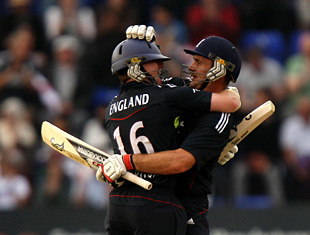 Michael Yardy and Eoin Morgan celebrate their match-winning stand as England secured a five-wicket at Cardiff