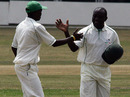 Steve Tikolo congratulates James Ngoche on his five-wicket haul, Kenya v Afghanistan, Intercontinental Cup, Nairobi, 3rd day, October 4, 2010