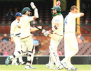 Luke Butterworth and Adam Maher celebrate their win in front of Doug Bollinger, New South Wales v Tasmania, Sydney, 3rd day, 19 November 2010