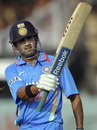 Gautam Gambhir raises his bat after reaching his second successive ODI century, India v New Zealand, 3rd ODI, Vadodara, December 4, 2010