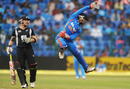 Brendon McCullum watches Parthiv Patel leap in the air to make a stop, India v New Zealand, 4th ODI, Bangalore, December 7, 2010