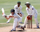 Reece Young prepares to sweep, New Zealand Cricket XI v Pakistanis, tour match, 3rd day, Whangarei, January 4, 2011