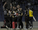 The Canada fielders celebrate the fall of a wicket, Canada v Hampshire, Antigua, Caribbean T20, Group B, January 11, 2011 