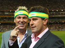 Mark Taylor and Shane Warne talk into the cameras while wearing headbands, Australia v England, 2nd Twenty20, MCG, January 14, 2011