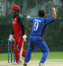 Peter Petricola removes Awal Khan after his crucial 81, Italy v Oman, WCL Division 3, Kowloon, January 25, 2011