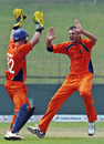 Atse Buurman and Bernard Loots celebrate the wicket of David Obuya, Kenya v Netherlands World Cup warm-up match, Sinhalese Sports Club, Colombo, February 15, 2011
