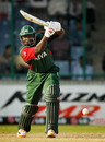 Thomas Odoyo drives during his 51, Canada v Kenya, Group A, World Cup, Delhi, March 7, 2011