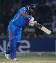 Yuvraj Singh comes down the wicket, India v Netherlands, Group B, World Cup, Delhi, March 9, 2011