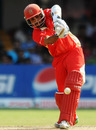 Ashish Bagai drives during his 39, Australia v Canada, Group A, World Cup, Bangalore, March 16, 2011