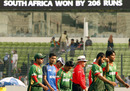 Bangladesh's players walk off dejected after being dumped out of the World Cup, Bangladesh v South Africa, Group B, World Cup 2011, March 19, 2011