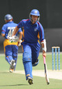 Namibia's Gerrie Snyman runs a single during his knock of 57, UAE v Namibia, Dubai, April 8, 2011