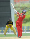 Hong Kong's Mark Chapman launches the ball during his unbeaten 70, Hong Kong v Uganda, Dubai, April 8, 2011