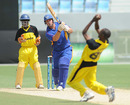 Deusdedit Muhumuza takes a sharp catch off his own bowling to dismiss Jan-Berrie Burger, Namibia v Uganda, Dubai, April 9, 2011