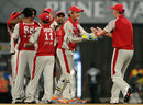 Kings XI Punjab celebrate the early dismissal of Graeme Smith, Pune Warriors v Kings XI Punjab, IPL 2011, Mumbai, April 10, 2011