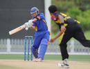 Namibia's Craig Williams hits out during his knock of 73 off 35 balls, Namibia v Papua New Guinea, Dubai, April 11, 2011