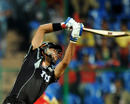 Yuvraj Singh lofts one straight down the ground, Royal Challengers Bangalore v Pune Warriors, IPL 2011, Bangalore, April 29, 2011