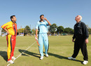 Botswana captain Akrum Chand tosses, while German captain Asif Khan and umpire Rudi Koertzen look on, Botswana v Germany, World Cricket League Division 7, Gaborone, May 4, 2011