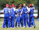 Japan celebrate Patrick Giles-Jones' dismissal of Femi Oduyebo, Japan v Nigeria, World Cricket League Division 7, Gaborone, May 5, 2011