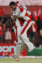 Shalabh Srivastava hugs Adam Gilchrist after dismissing David Warner, Kings XI Punjab v Delhi Daredevils, IPL 2011, Dharamsala, May 15, 2011