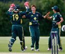 Australia get together after Shelley Nitschke snags a wicket, Australia Women v India Women, NatWest Women's T20 Quadrangular Series, Billericay, June 23, 2011