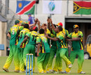 The Vanuatu fielders celebrate the fall of a wicket, Namibia U-19s v Vanuatu U-19s, Dublin, July 29, 2011