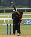 Suresh Navaratnam steams in for Malaysia, Malaysia v Kuwait, World Cricket League Division Six, Kuala Lumpur, September 17 2011