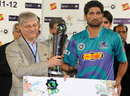 Rawalpindi Ram's Sohail Tanvir collects the runners-up trophy, Final, Rawalpindi Rams v Sialkot Stallions, Faysal Bank T20, Karachi, October 2, 2011
