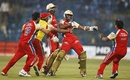 Royal Challengers Bangalore players rush to congratulate Arun Karthik, Royal Challengers Bangalore v South Australia, Champions League T20, October 5, 2011