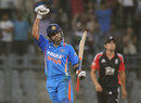 Virat Kohli punches the air after India seal victory, India v England, 4th ODI, Mumbai, October 23, 2011
