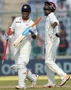 MS Dhoni picks up a souvenir after India's victory, India v West Indies, 1st Test, New Delhi, 4th day, November 9, 2011