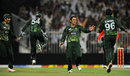 Saeed Ajmal is congratulated on dismissing Angelo Mathews, Pakistan v Sri Lanka, 4th ODI, Sharjah, November 20, 2011