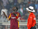 Darren Sammy looks up to see if the rain has stopped, India v West Indies, 2nd ODI, Visakhapatnam, December 2, 2011